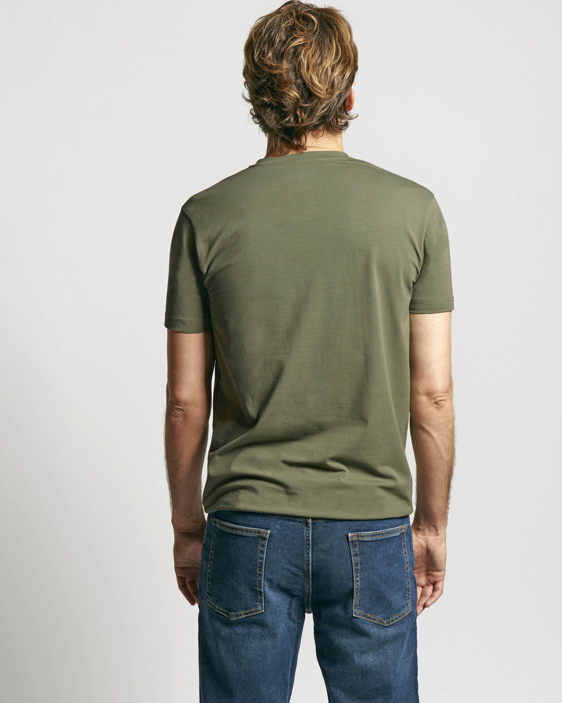 Model wearing Neat_Sweat-Proof_Crew-Neck Green T-shirt