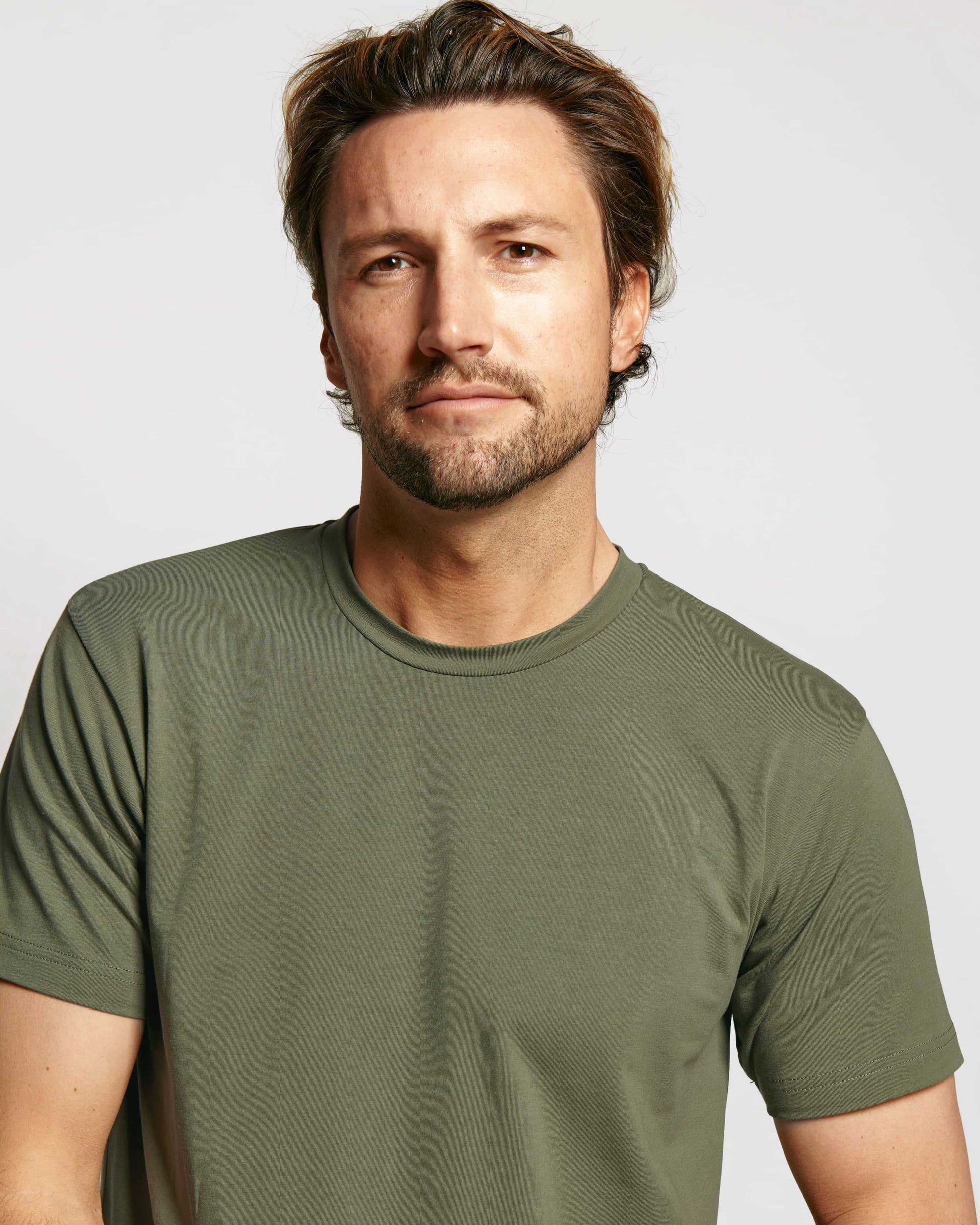 Model wearing Neat_Sweat-Proof_Crew-Neck Green T-shirt