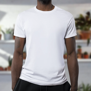 Front view of a white short-sleeve crew-neck T-shirt on a model with a blurred indoor background