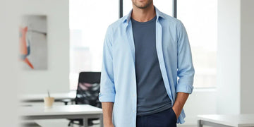 Man standing confidently in professional attire that supports comfort and focus.