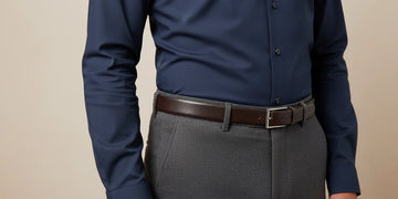 Close-up of a well-fitted shirt and trousers with clean lines.