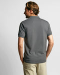 Model wearing Neat Sweat Proof Short Sleeve Polo PDP Grey