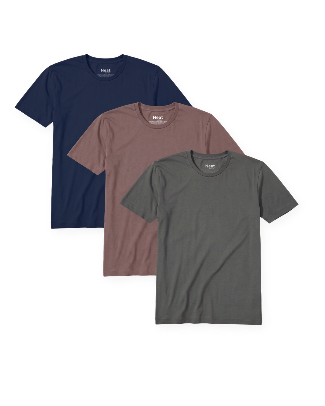 The Navy and Clay Pack: three Neat crew neck shirts fanned on a transparent background, Deja Blue, Dusty Clay and Stone Grey