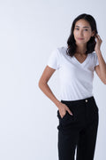 Model wearing Women's Sweat Defender v-neck undershirt