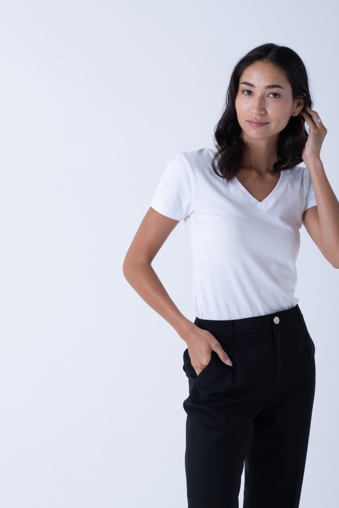 Model wearing Women's Sweat Defender v-neck undershirt
