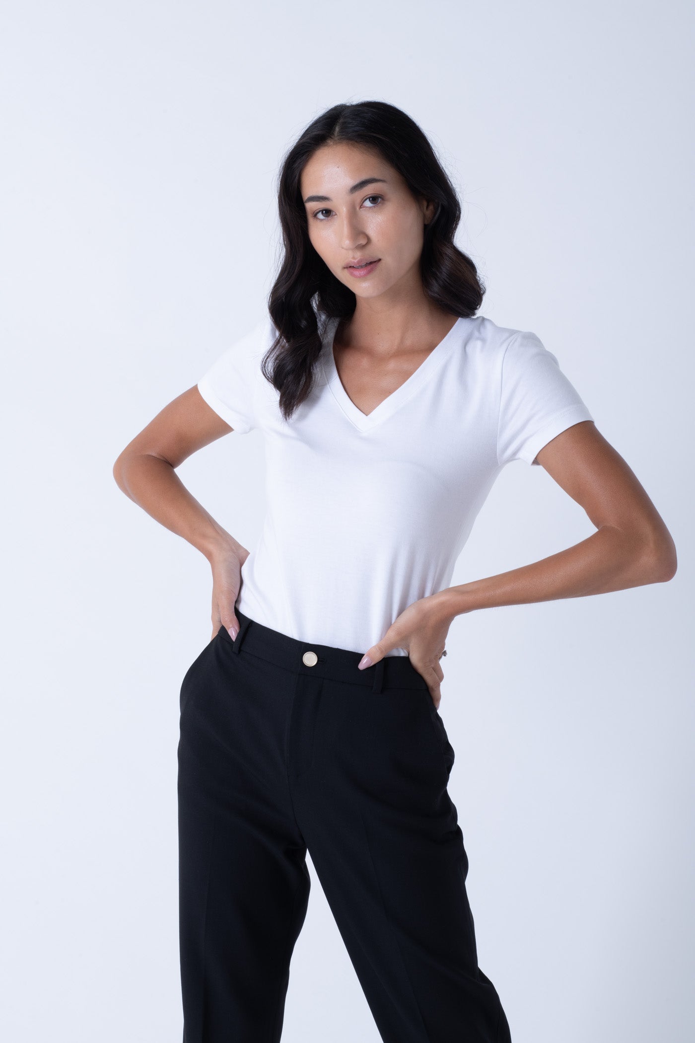 Model wearing Women's Sweat Defender v-neck undershirt